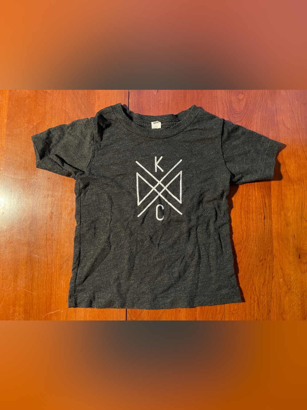 Black Graphic Tee with White Geometric Logo KC - Kansas City